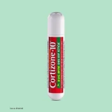 Cylindrical Cortizone-10 bug bite relief stick with red and green label on a light green background. Text includes "use as directed."