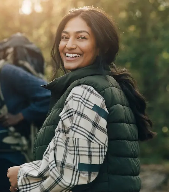Portrait of a smiling woman during a camping vacation