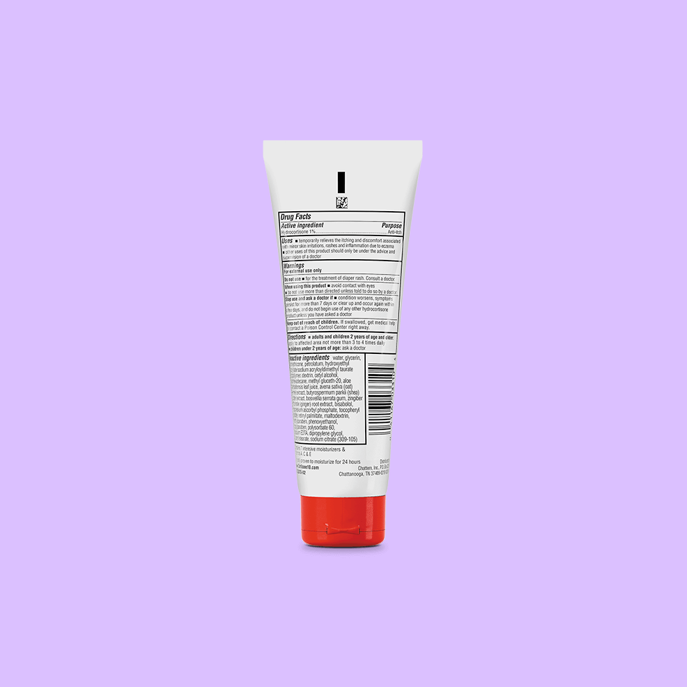 White tube with a red cap on a lavender background. The tube displays text and a barcode, indicating product details and ingredients.